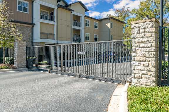 A gated entrance to a residential building.