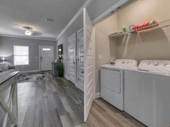 A laundry room with a washer and dryer.