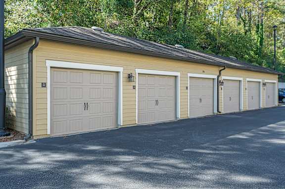 A row of garage doors are closed.