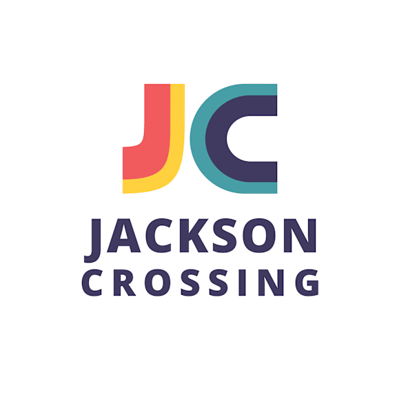 Jackson crossing logo with a white background.