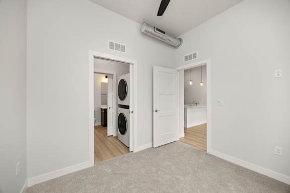 A room with a washer and dryer in it.