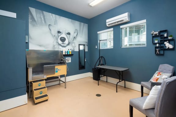 a treatment room with a painting of a polar bear on the wall