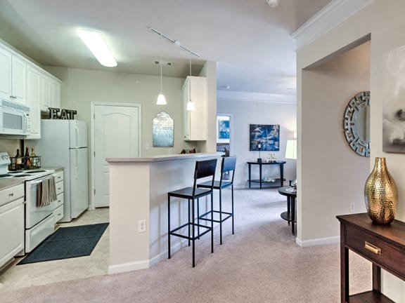 Dining space with new wood plank flooring at Abberly Green Apartment Homes by HHHunt, Mooresville, NC