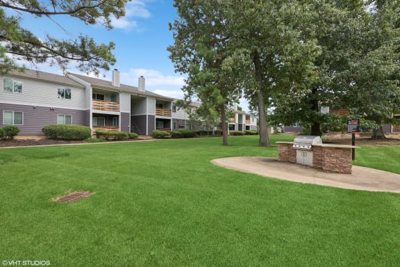 our apartments have a spacious yard with a fire pit