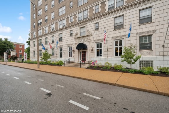 a large building on the side of a street at CWE Apartments, St. Louis, MO, 63108