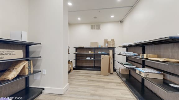 a room filled with boxes and boxes on shelves in a store at Bristol On Union Apartment Homes, Memphis, TN, 38104
