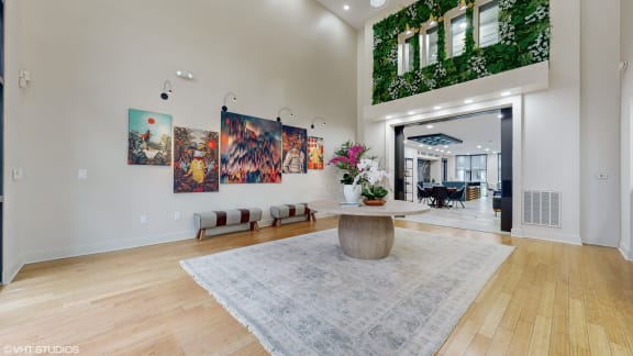 the living room is open to the dining room and kitchen at Bristol On Union Apartment Homes, Memphis