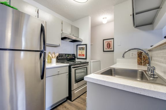 Fully Equipped Kitchen with Stainless Steel at Wildwood Apartments, CLEAR Property Management, Austin, TX