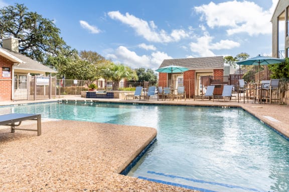 Swimming Pool And Sundeck at Wildwood Apartments, CLEAR Property Management, Austin, Texas