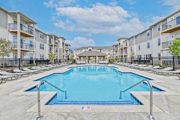 the swimming pool at the preserve at polk apartments