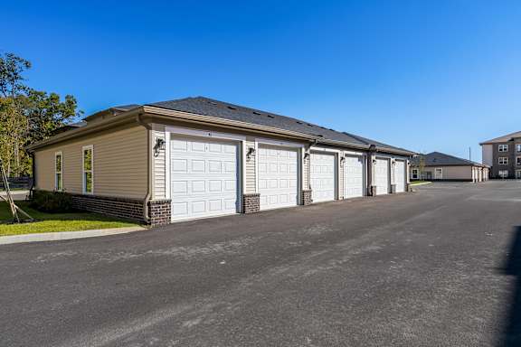 A row of garage doors are closed.