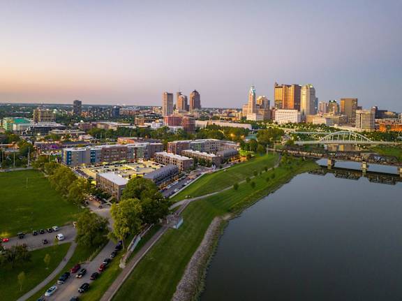 A cityscape with a river running through it.