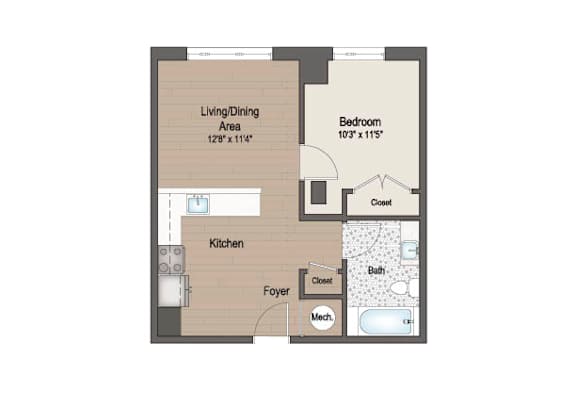 A floor plan of a small apartment with a living/dining area, bedroom, and kitchen.