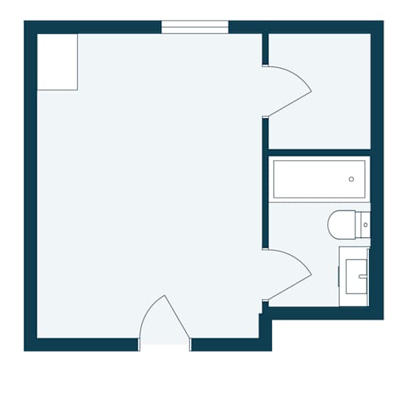 A floor plan of a room with a kitchen area and a bathroom.