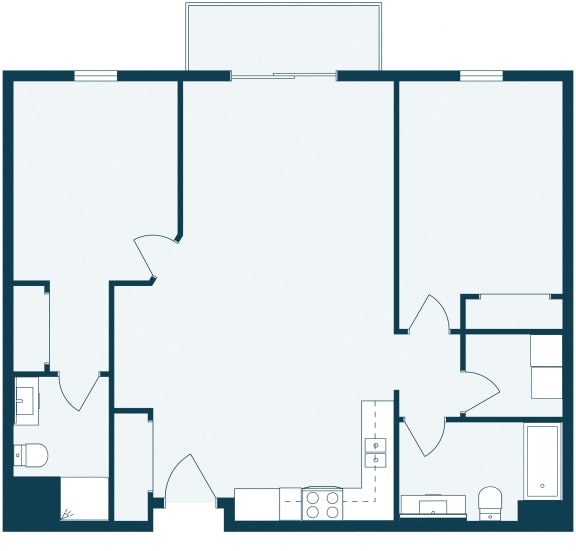 the floor plan of the lower level of the unit with a kitchen and living room