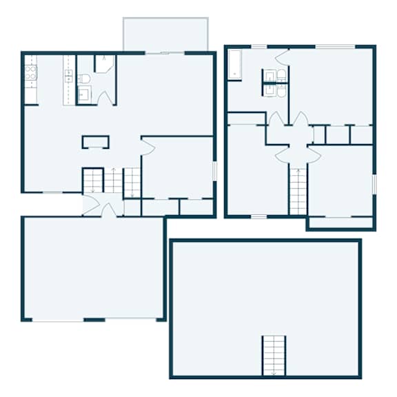 A floor plan of a house with multiple rooms and a staircase.