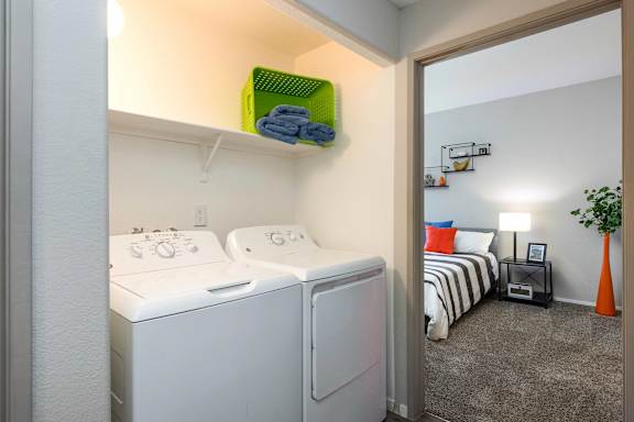 A laundry room with a washer and dryer.
