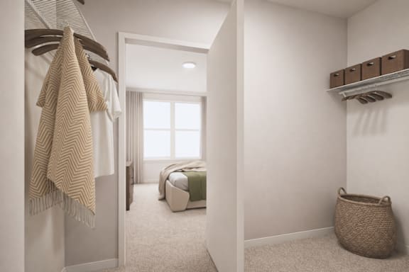 A bedroom with a bed, a window, and a basket on the floor.