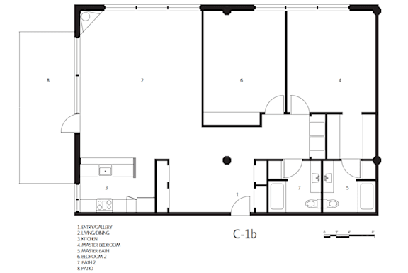 A black and white floor plan of a C-1b room with labeled rooms and furniture.