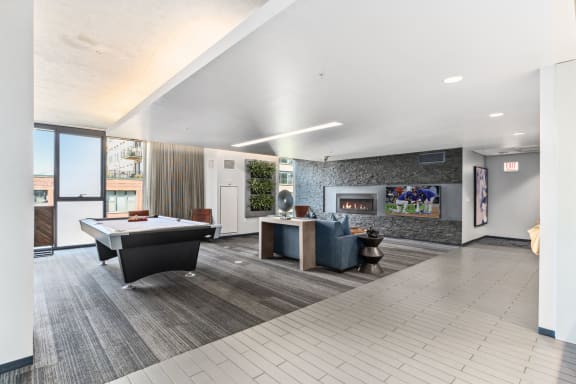 the preserve at ballantyne commons community room with pool table and tv at One 333, Chicago, Illinois