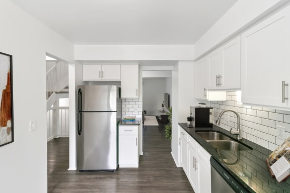Fully Furnished Kitchen With Stainless Steel Appliances at The Village of Hyde Park, Detroit, Michigan