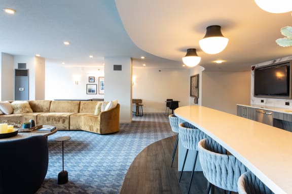 a living room with a couch and a table at Kingsbury Plaza, Illinois