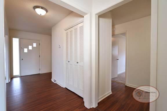 The foyer and hallway leading to bedrooms.