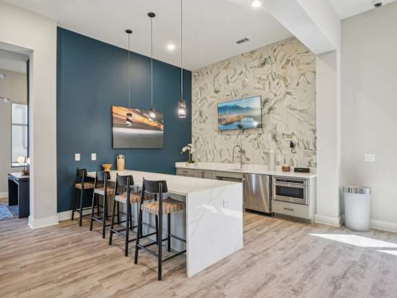 Kitchen with white island at Ardmore Meadows, Whitsett, NC, 27377
