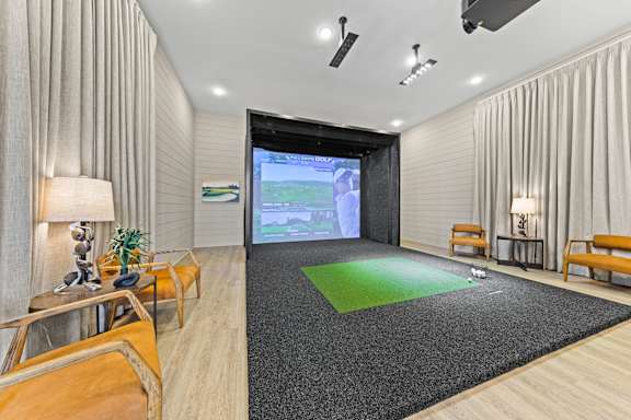 Modern Golf Simulator in a room at Views at Flowers, Clayton, NC, 27527