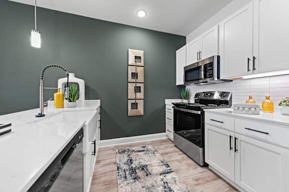 Kitchen with Cabinets at Views at Flowers, Clayton