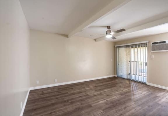 an empty room with a ceiling fan and a window at Mountainview Venture, Covina California