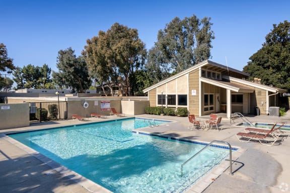 our apartments have a swimming pool and a patio with chairs at Alosta Place, Azusa, 91702