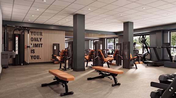 A gym with a sign that says "Your only limit is you."