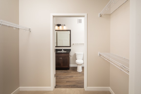 a bathroom with a toilet and a sinkat The Carver Apartments, Chaska, 55318