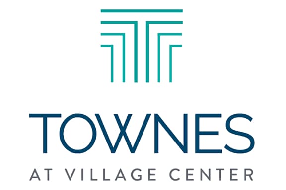 A logo with the words "Townes at Village Center" in blue.
