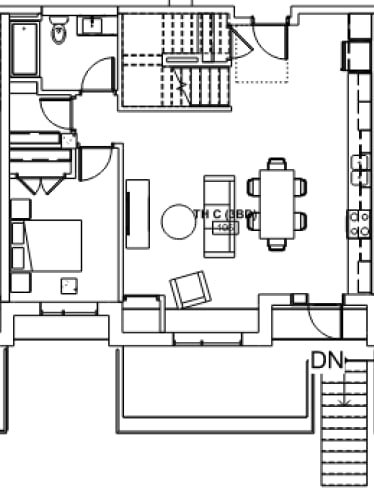 A floor plan of a house with a kitchen, living room, and dining area.