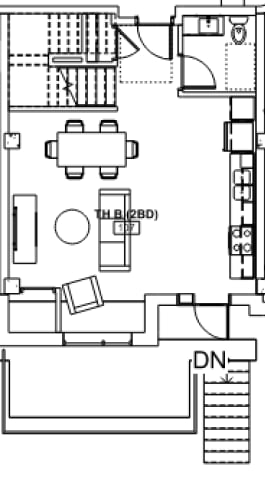 A floor plan of a room with furniture and appliances.