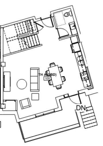 A floor plan of a room with a kitchen area and a bathroom.