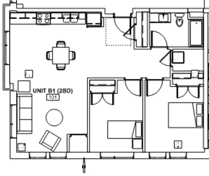 A floor plan of a unit with a kitchen, living room, and two bedrooms.