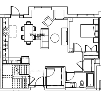 A floor plan of a house with a kitchen, living room, and dining area.