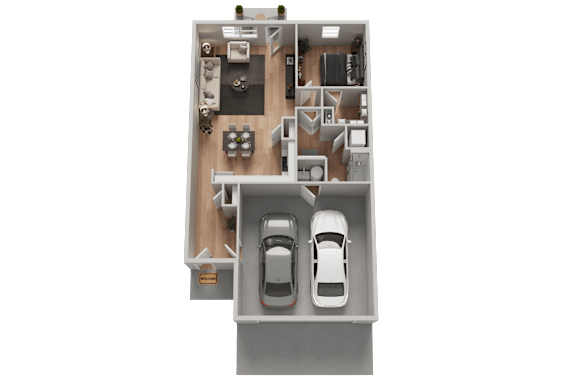 A floor plan of a house with two cars parked in the garage.