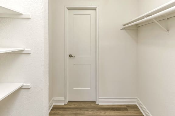 Walk-in Closets amenity - Beautiful newly-renovated one, two and three bedroom apartment townhomes with high-end finishes at Highpoint Apartments in Omaha, NE