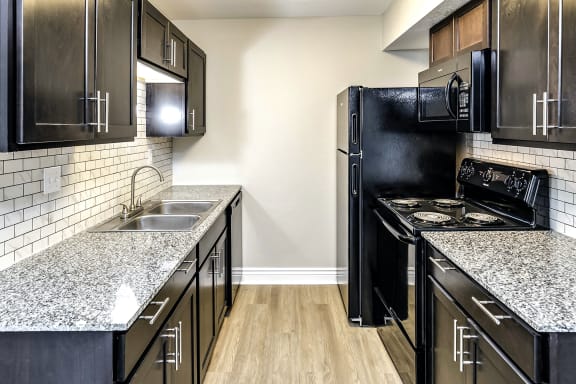Beautiful newly-renovated one, two and three bedroom apartment townhomes with high-end finishes at Highpoint Apartments in Omaha, NE