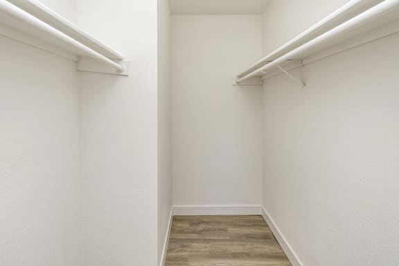 Walk-in Closets amenity - Beautiful newly-renovated one, two and three bedroom apartment townhomes with high-end finishes at Highpoint Apartments in Omaha, NE
