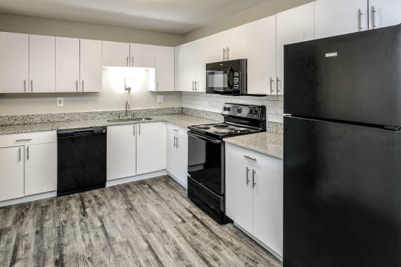 Beautiful newly-renovated one, two and three bedroom apartment townhomes with high-end finishes at Highpoint Apartments in Omaha, NE