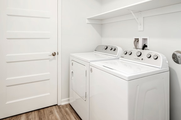 One, two and three-bedroom floor plans featuring two interior design schemes, quartz countertops, tile backsplash, stainless steel appliances, backlit mirrors, high-end finishes and more at 148 Place Apartments in Omaha, NE