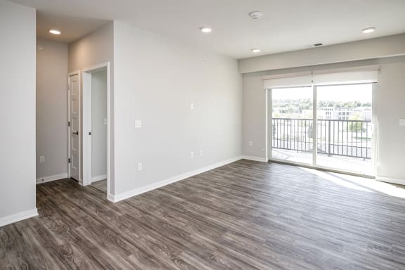 One, two and three-bedroom floor plans featuring two interior design schemes, quartz countertops, tile backsplash, stainless steel appliances, backlit mirrors, high-end finishes and more at 148 Place Apartments in Omaha, NE