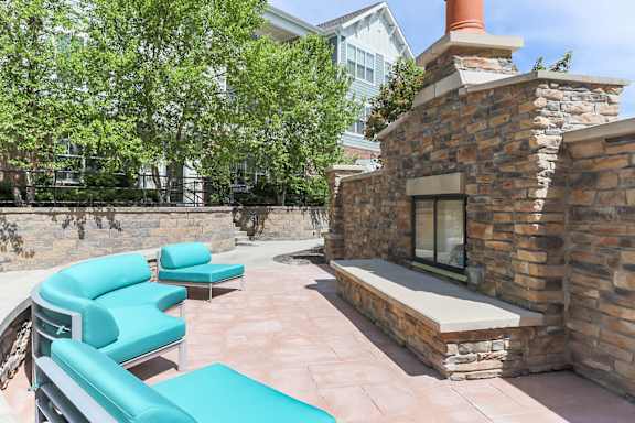 Outdoor Lounge with Fireplace at Aventine at Wilderness Hills in Lincoln, NE