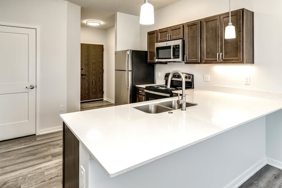Kitchen with Granite countertops at Belle Point in Bellevue, NE