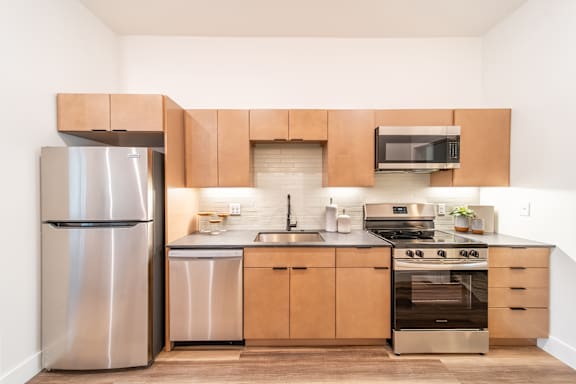 Custom cabinetry with ample storage at Coler Crossing in Bentonville, AR